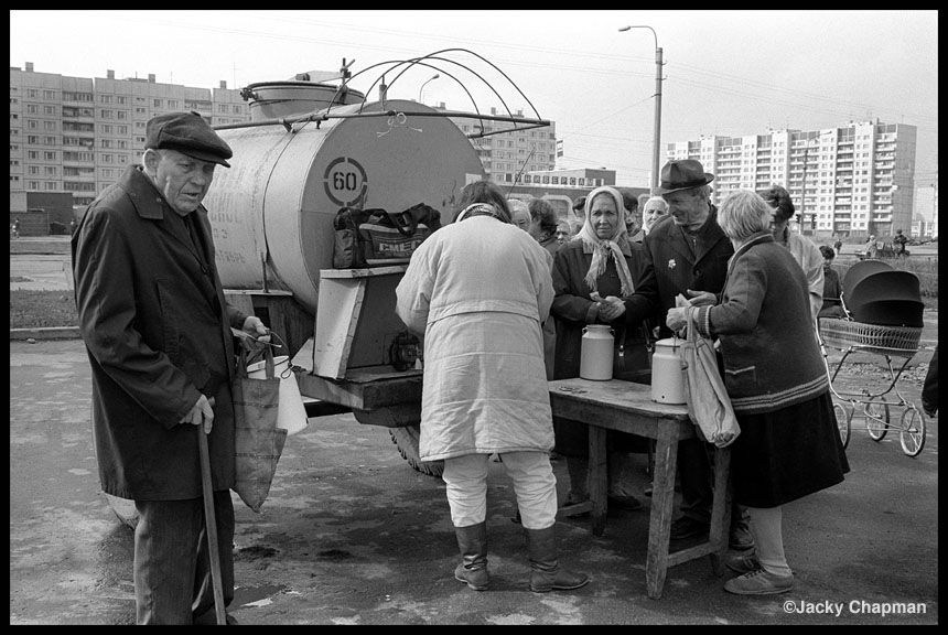 Milk queue Not because of lack of milk but because its fresh from farm and cheaper than in shops. Comes everyday.  St Petersburg, Russia