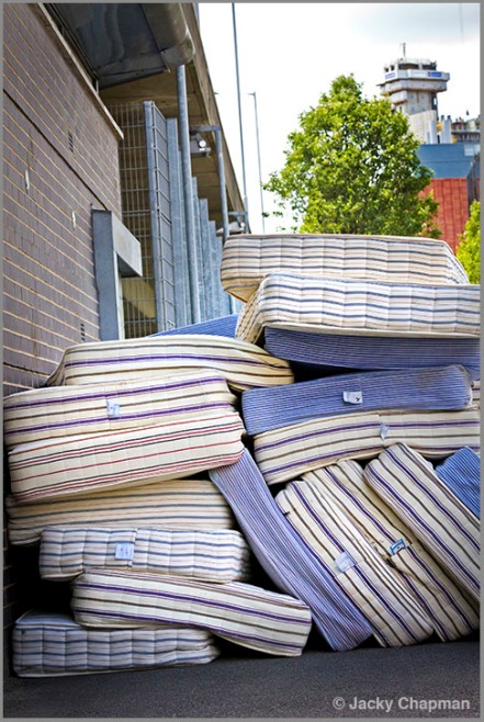 15 June 2017. Donated mattresses piled high near the Westway sports centre, an emergency accommodation centre.
